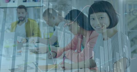 Diverse team analyzing financial growth with creative strategies