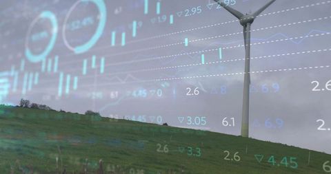 Wind turbine on green hill with digital data overlay