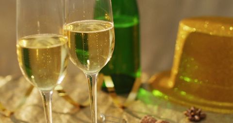Celebratory Champagne Glasses with Festive Golden Decorations - Download Free Stock Images Pikwizard.com