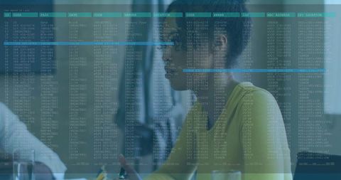 Female Leader Presenting with Code Overlay in Boardroom Highlighting Cybersecurity Strategy