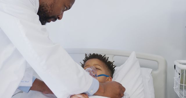 Doctor attending to African child in hospital bed, ensuring patient is comfortable and receiving proper medical care. Ideal for illustrating healthcare professionals in a caring environment, showcasing pediatric healthcare services, and promoting hospital care scenarios.