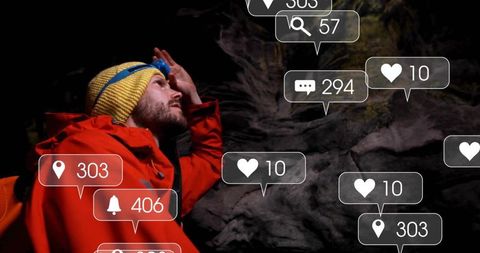 Explorer in cave surrounded by digital social icons