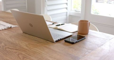 Modern Workspace with Laptop and Notebook on Wooden Table - Download Free Stock Images Pikwizard.com