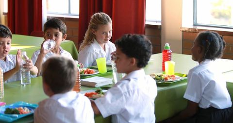 Children Enjoying Lunch in School Cafeteria Communal Setting - Download Free Stock Images Pikwizard.com