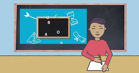 Schoolboy writing enthusiastically with learning symbols