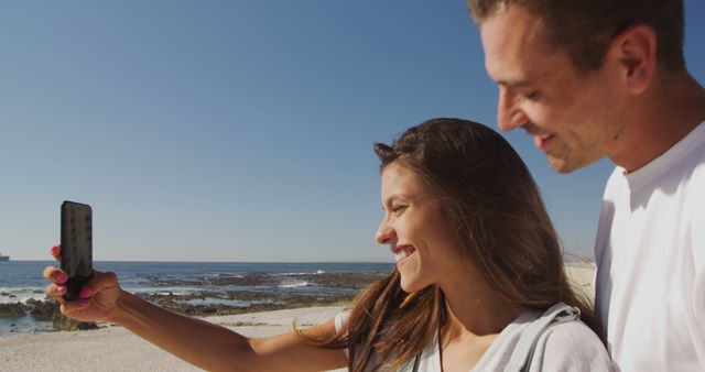 Smiling Couple Taking Selfie on Beach - Download Free Stock Images Pikwizard.com