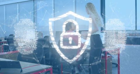 Securing office data with shield and padlock hologram over fingerprint for cybersecurity