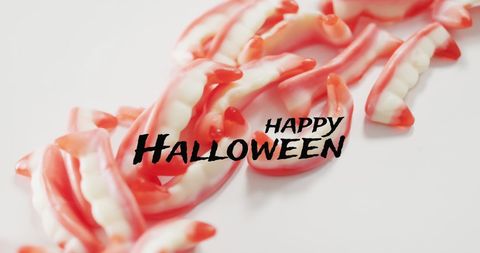 Happy Halloween Text with Candy Teeth