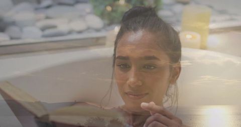 Serene Bathing Experience with Book and Candlelight