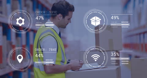 Warehouse Supervisor Analyzing Data Through Innovative Technology