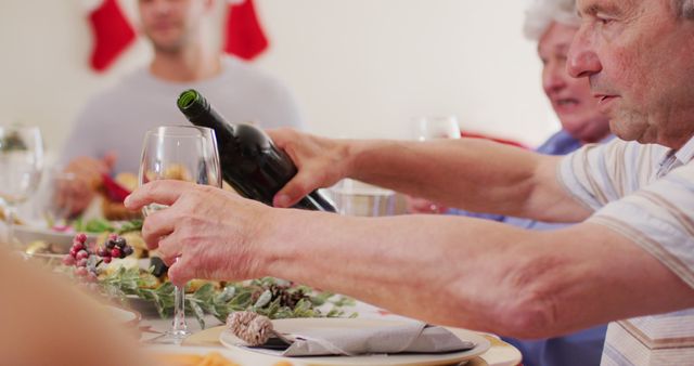 Family Celebrating Holiday Feast with Wine - Download Free Stock Images Pikwizard.com