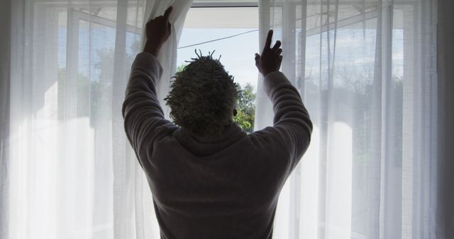 Elderly Person Opening Curtains to Sunshine - Download Free Stock Images Pikwizard.com