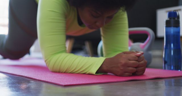 Woman Doing Plank Exercise on Yoga Mat - Download Free Stock Images Pikwizard.com