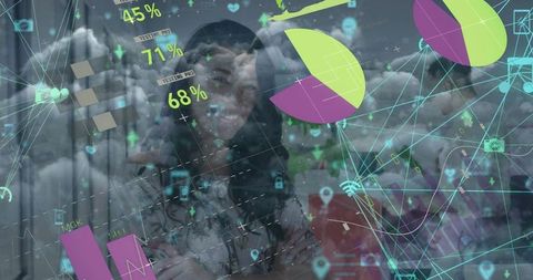 Business Professionals Using Transparent Display with Data Visualizations