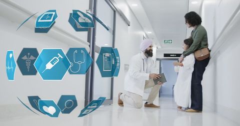 Doctor Consulting Mother and Child with Digital Health Icons