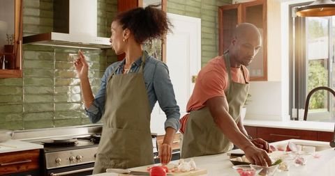 Couple Cooking Together in Modern Kitchen at Home