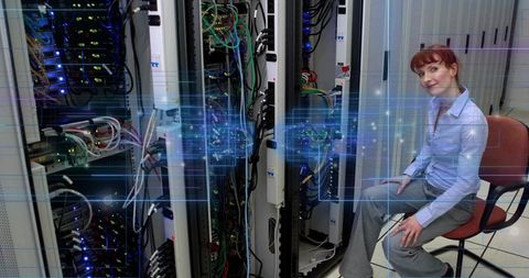 Technician Managing Network Traffic in Modern Data Center