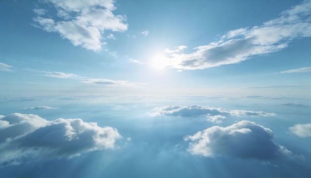 Sunlight streaming over high-altitude cumulus clouds with soft rays and blue expanse