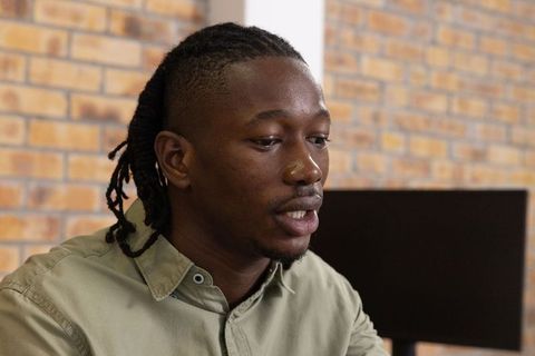 Focused african american professional in urban office setting