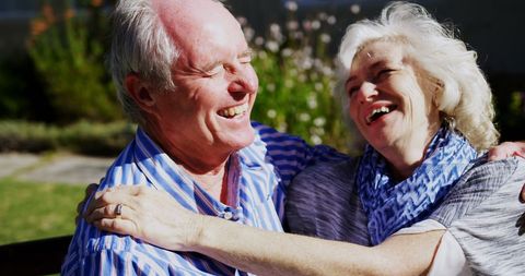 Happy Senior Couple Embracing in Garden at Nursing Home - Download Free Stock Images Pikwizard.com