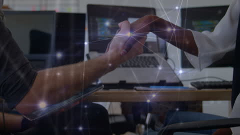 Diverse Businesswomen Shaking Hands with Digital Network Overlay