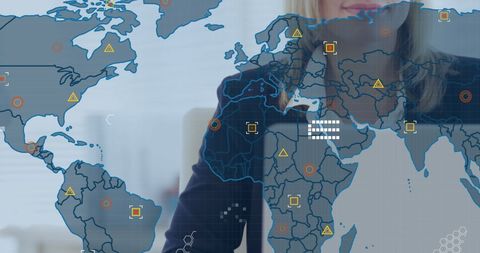 Businesswoman Analyzing Global Financial Data with Digital World Map Overlay - Download Free Stock Images Pikwizard.com