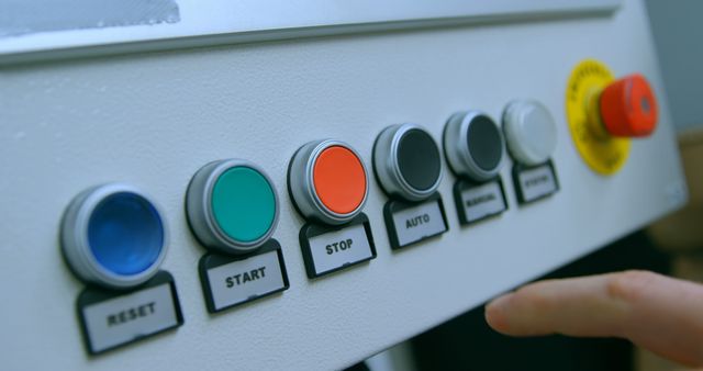 Hand Operating Control Panel with Multi-Colored Buttons - Download Free Stock Photos Pikwizard.com