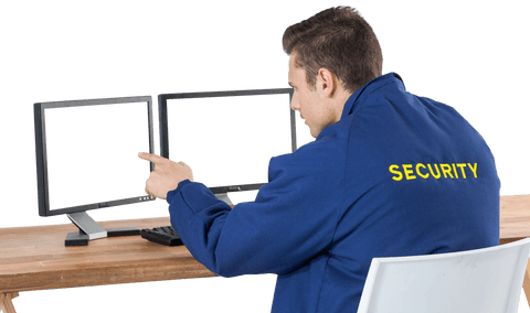 transparent back view of security officer at dual monitors desk - Download Free Stock Videos Pikwizard.com