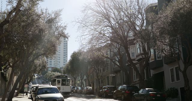 Sunny Urban Street with Cable Car in Hilly San Francisco Neighborhood - Download Free Stock Images Pikwizard.com