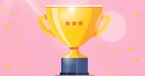Gold trophy cup on pink background with sparkles