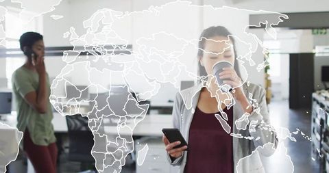 Business Team Using Smartphones Communicating in Modern Office