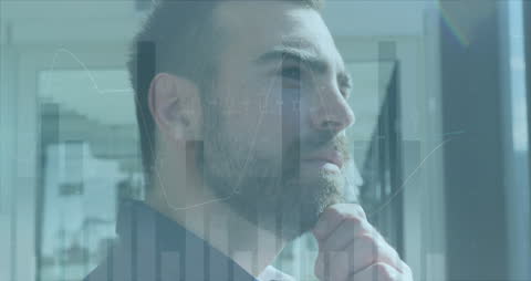 Businessman Analyzing Data with Digital Overlay in Office