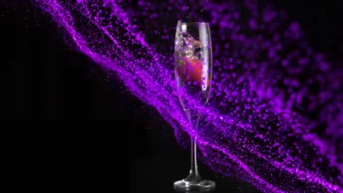 Strawberry Descends into Flute Creating Vibrant Purple Splash
