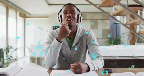 Young Man Using AR Technology with Headphones for Innovation Demo