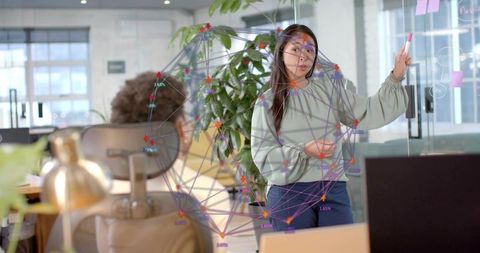 Innovative Team Collaboration with Network Diagram in Modern Office