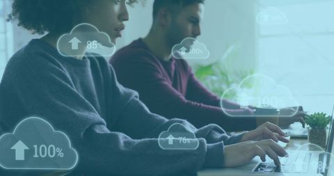 Diverse Team Engaging in Cloud Data Management in Office