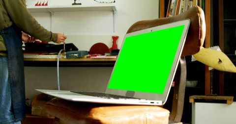 Modern Home Office with Laptop and Creative Workspace