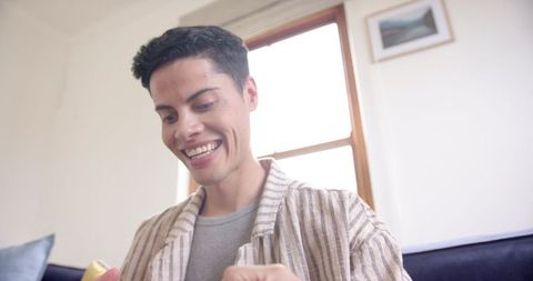 Happy smiling man opening online delivery box