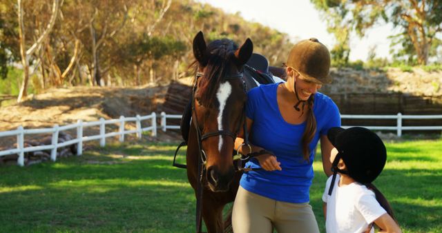Woman and Young Girl Smiling by Horse in Outdoor Stable - Download Free Stock Images Pikwizard.com