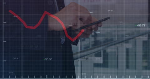 Businessperson Analyzing Financial Data on Smartphone