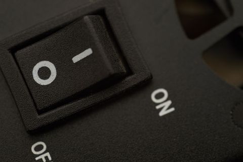 Close-up of black on-off power switch