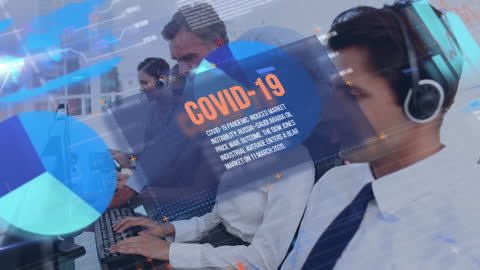 Business Professionals Analyzing COVID-19 Data with Technology