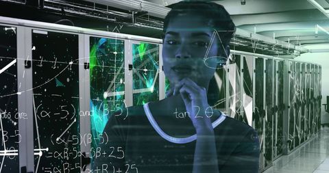 woman analyzing data in computer server room for digital innovation - Download Free Stock Images Pikwizard.com