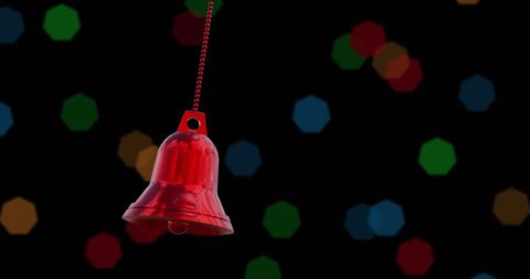 Festive Red Bell Decoration Against Colorful Light Bokeh - Download Free Stock Images Pikwizard.com