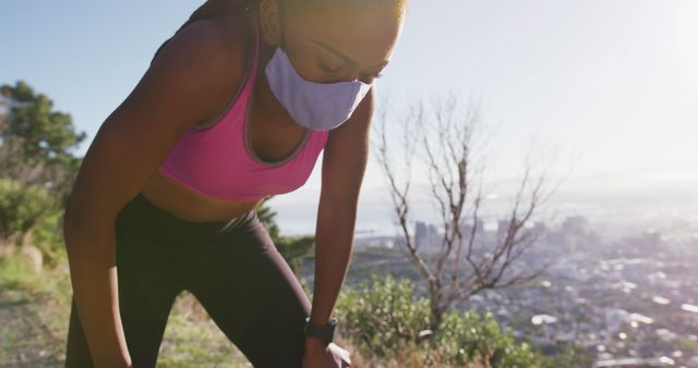 Woman Wearing Mask Resting During Outdoor Exercise - Download Free Stock Images Pikwizard.com