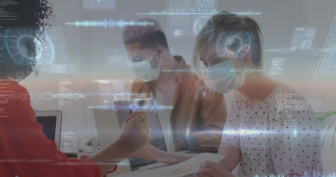 Business Team Collaborating with Digital Data Overlay During Pandemic