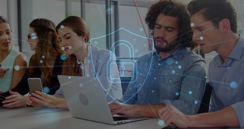 Diverse Team Discussing Data Protection Measures in Office - Download Free Stock Images Pikwizard.com