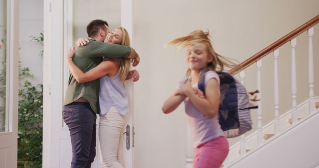 Happy family reunion with parents hugging and daughter running - Download Free Stock Images Pikwizard.com