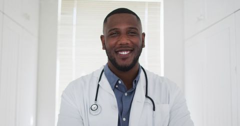 Confident African American Doctor Smiling Indoors - Download Free Stock Images Pikwizard.com