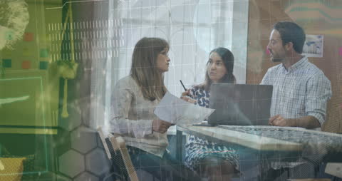 Collaboration of Diverse Business Team Analyzing Financial Data